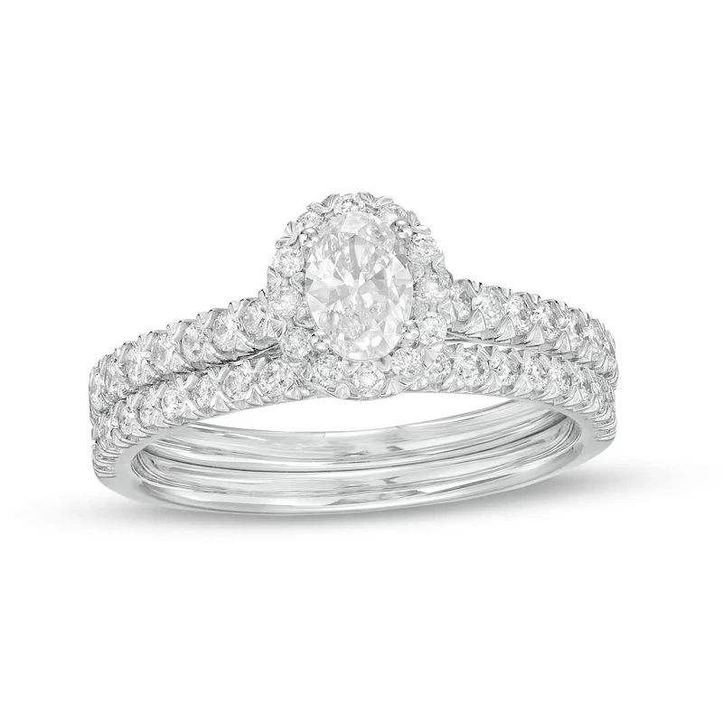 1 Ct. T.w. Oval Diamond Frame Bridal Set In 10k White Gold