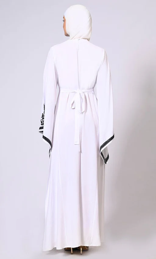 White Abaya With Bell Sleeves Adorned In Embroidery